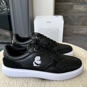 KARL LAGERFELD PARIS
Embroidered Logo Leather Low-Top Sneakers. Men’s size 10.5.